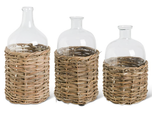 Glass Bottles in Woven Rattan Baskets